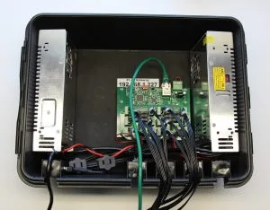 Inside the controller enclosure. Power supply on each side, controller board in the middle and still a little room for future accessories.