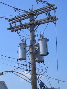 Skinny wires coming into the transformer and fat ones going out.