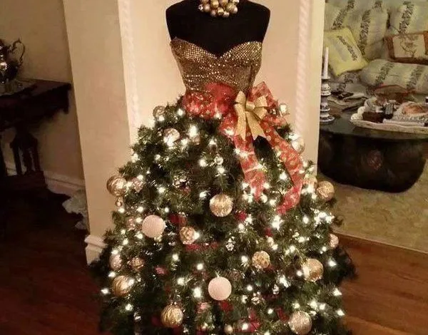 christmas trees shaped like dresses Christmas is right around the corner, and there are a million traditional  or non-traditional ways you could decorate your home for the holidays. In  the past, we've shown you how to create